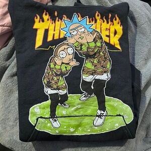 Black hoodie, with Thrasher rick and morty cracked detail
